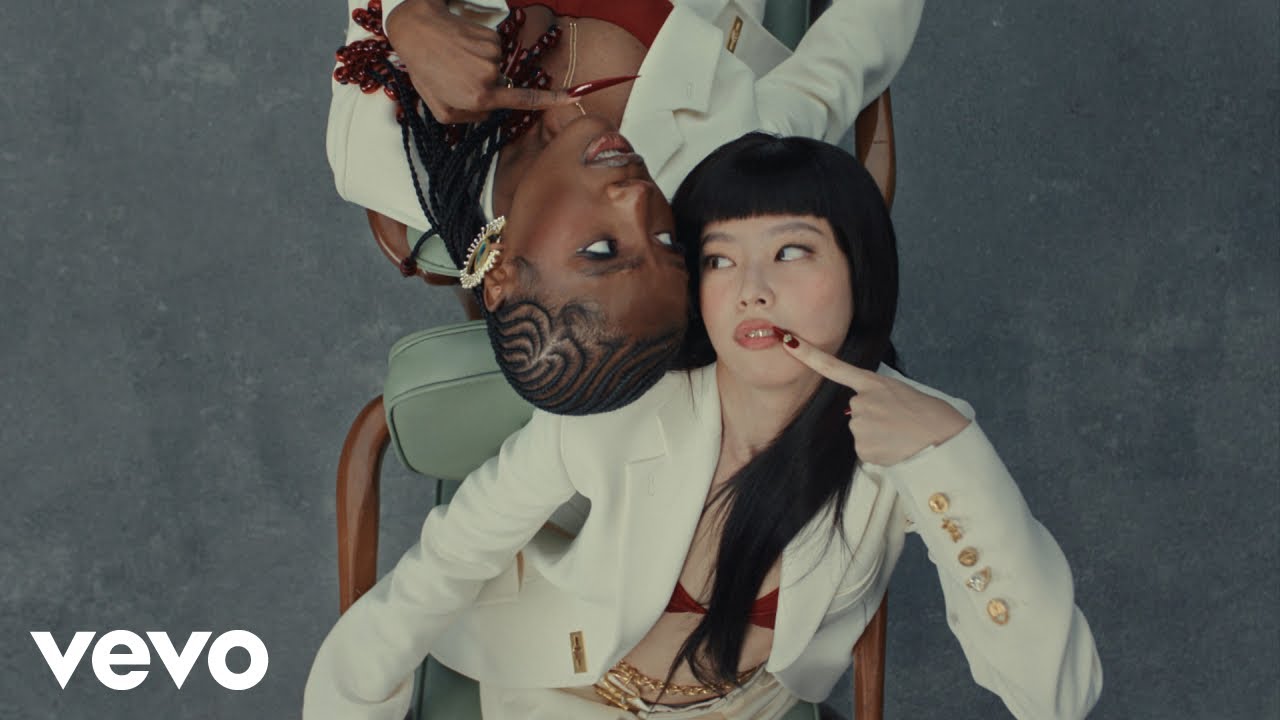 The latest release, “ExtraL,” pairs Jennie with Doechii in a music video-enhanced collaboration that oozes confidence. These two female artists—Jennie from South Korea and Doechii from Tampa, Florida—bring a vibe of fierce autonomy.